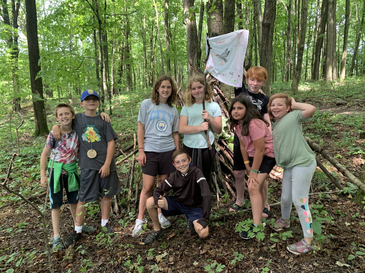 Children participating in a hands-on nature activity at REGI