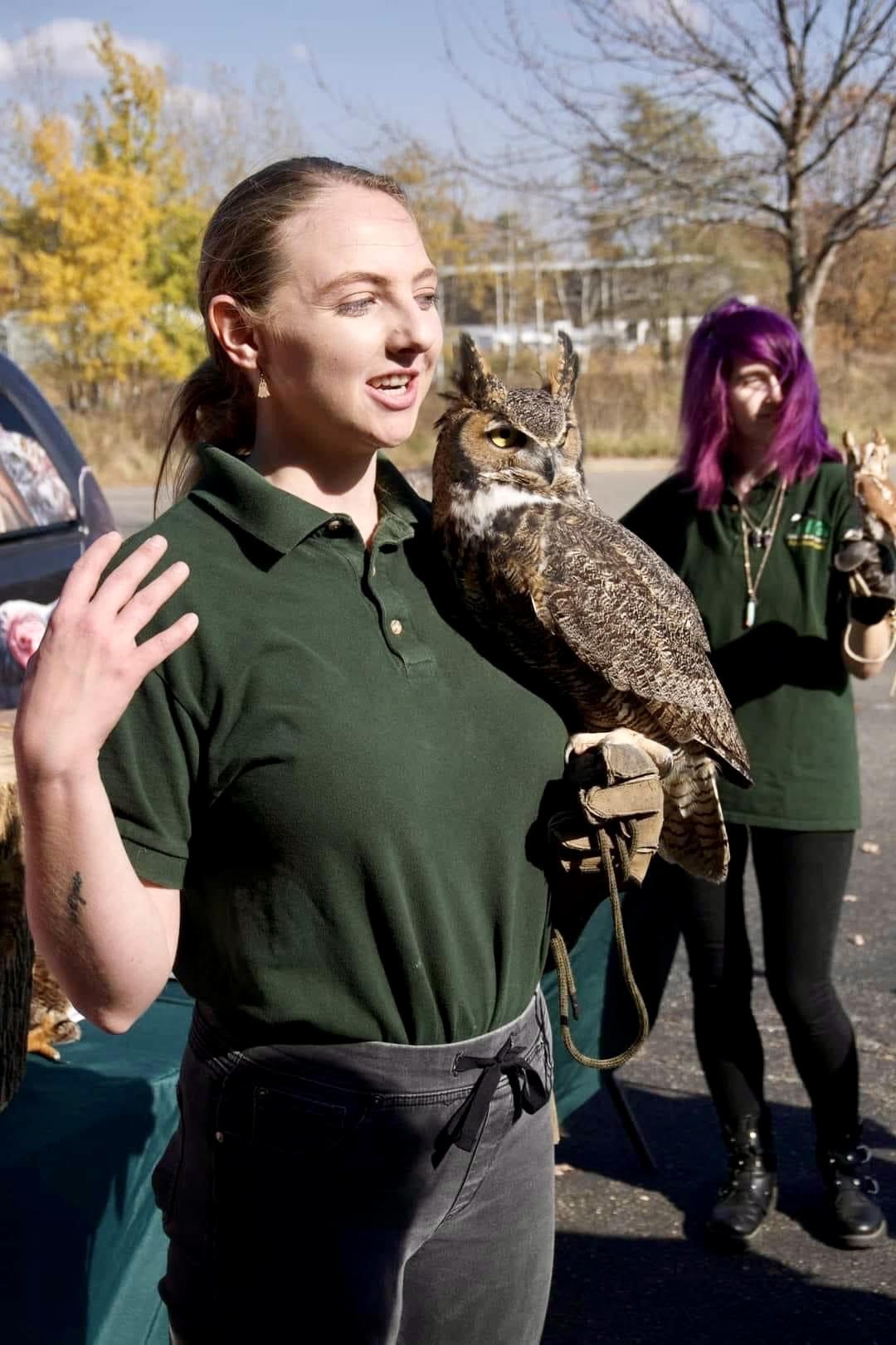 A REGI educator presenting with a great horned owl
