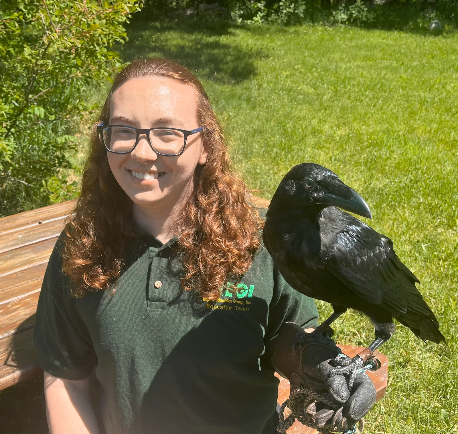 Cinna Smallwood holding an American crow